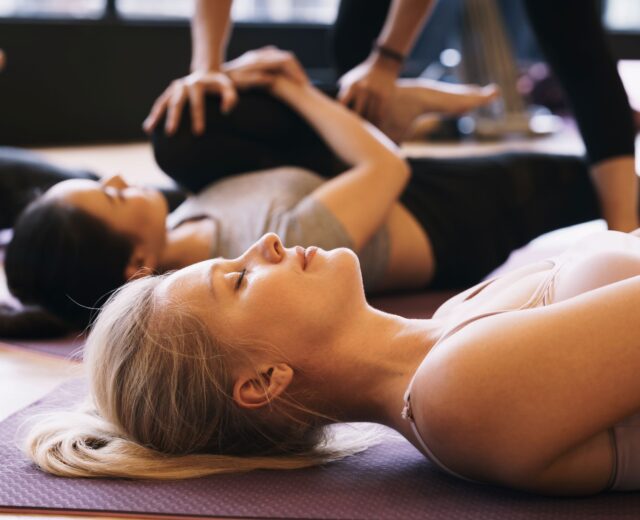 photo of teens doing yoga