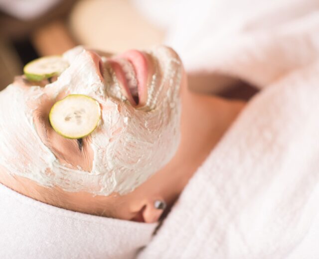 photo of a woman with clay spa mask