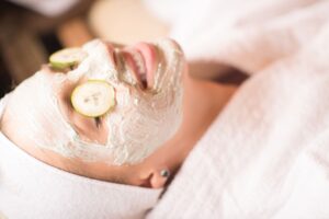 photo of a woman with clay spa mask