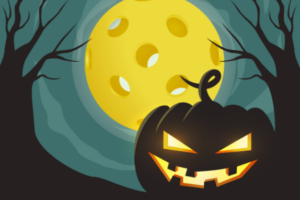 graphic of a jack o lantern with a moon in the background that is a pickleball